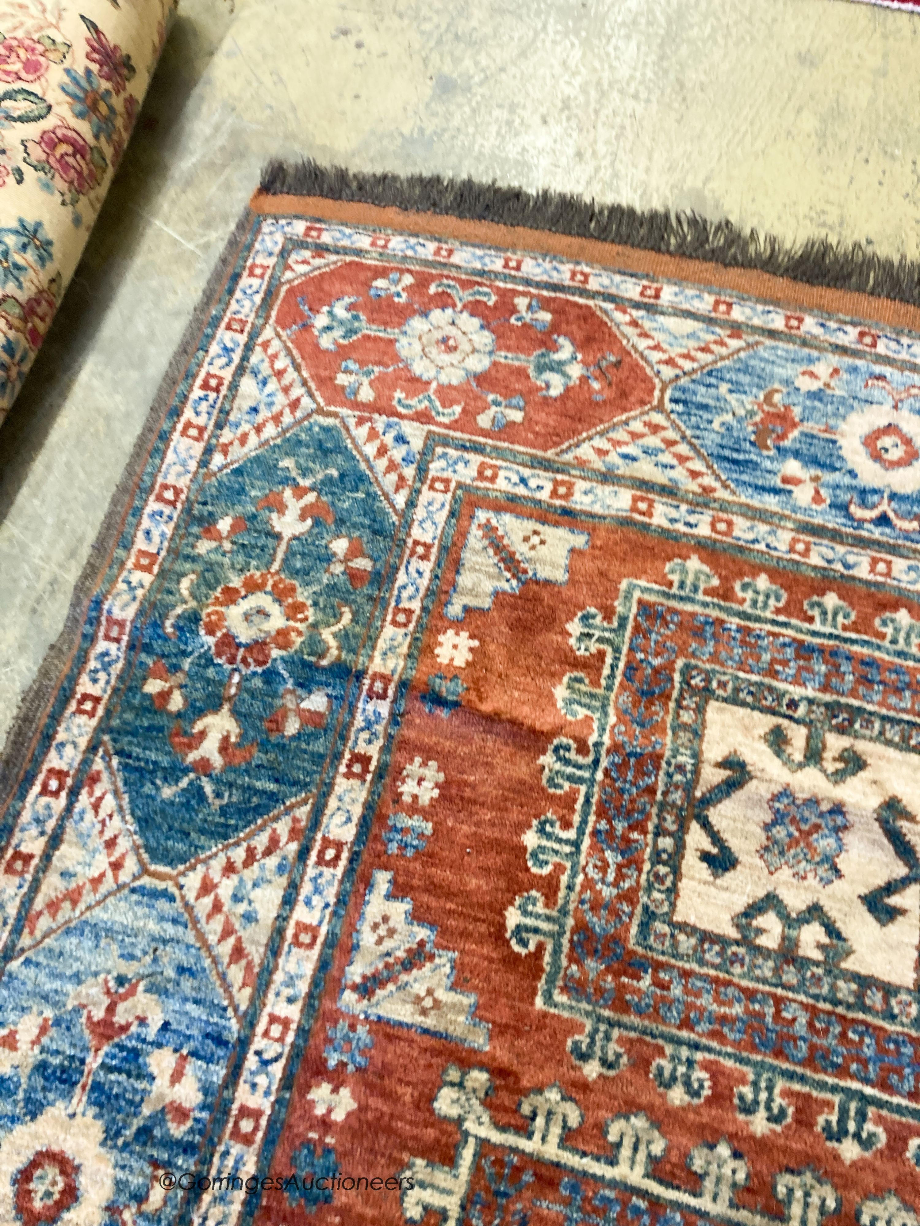 A Caucasian design carpet, 240 x 170cm